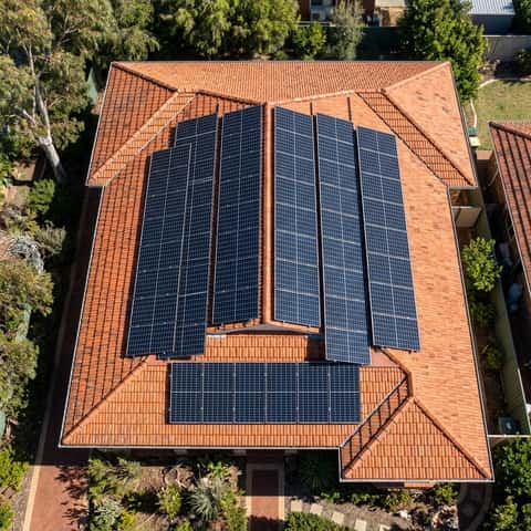 Aerial view of residential solar panels on a Perth home roof