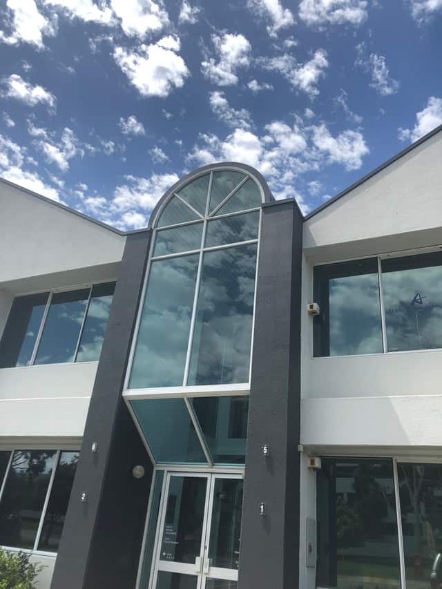Office building with an arched gable window suited to nanocoating protection, Perth