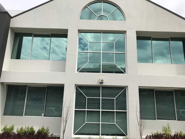 Commercial Perth building exterior with arched window feature suited to nanocoating