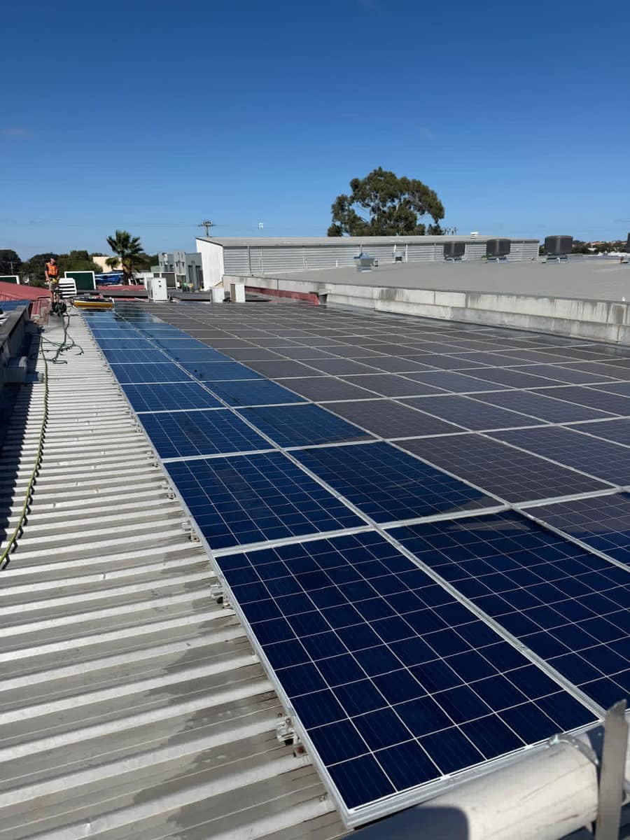 Solar panels showing a clear before and after split, dirty left and clean right, Perth