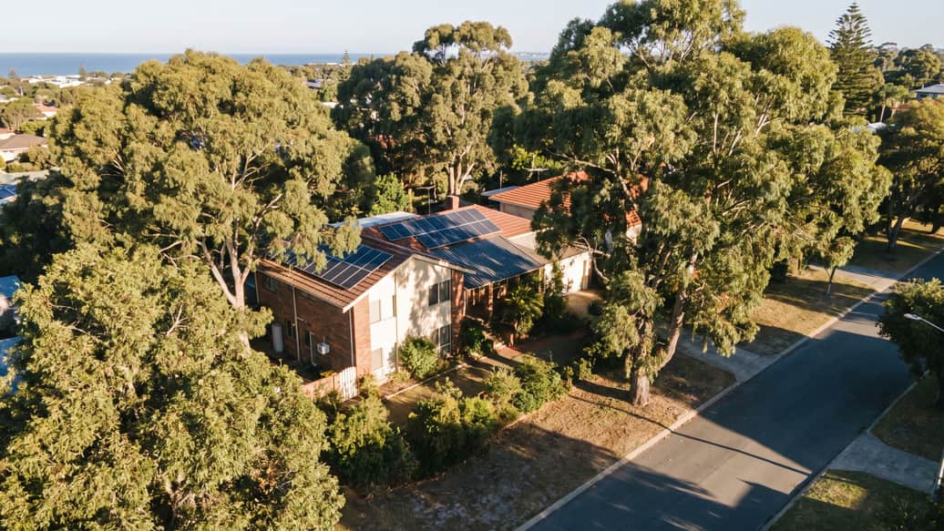 An established home under mature trees on a leafy street a few blocks from the coast, Swanbourne