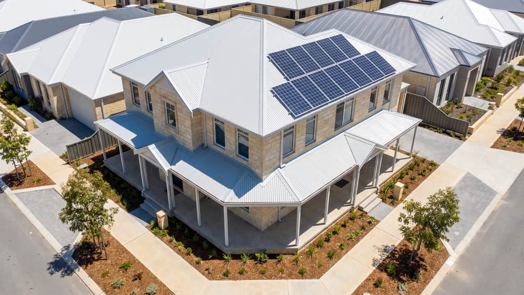 A newly built double-storey home with solar panels in a new housing estate, Hammond Park