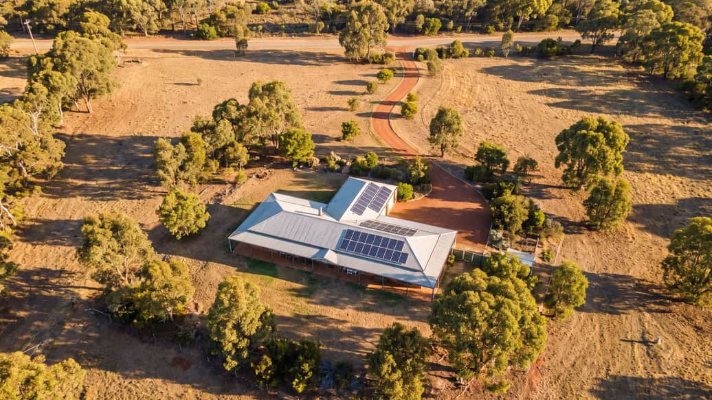 A rural-residential home with solar panels on a larger acreage block, Wattleup