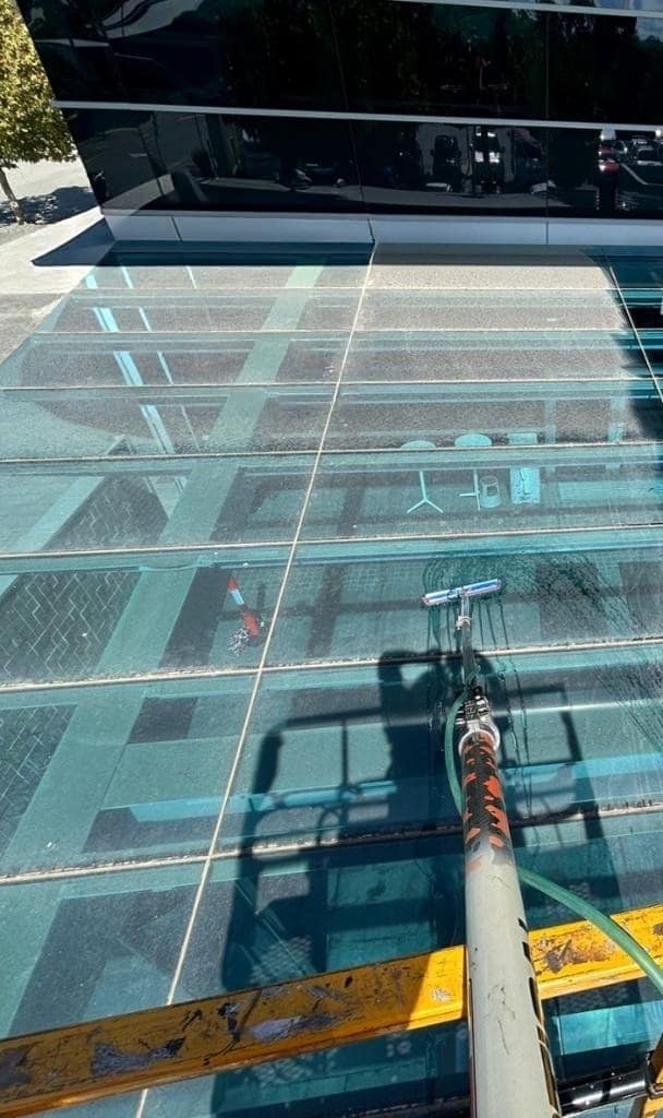 Before: streaked glass facade, commercial window cleaning result in Perth